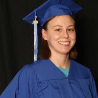 soon to be graduate with hand on hip